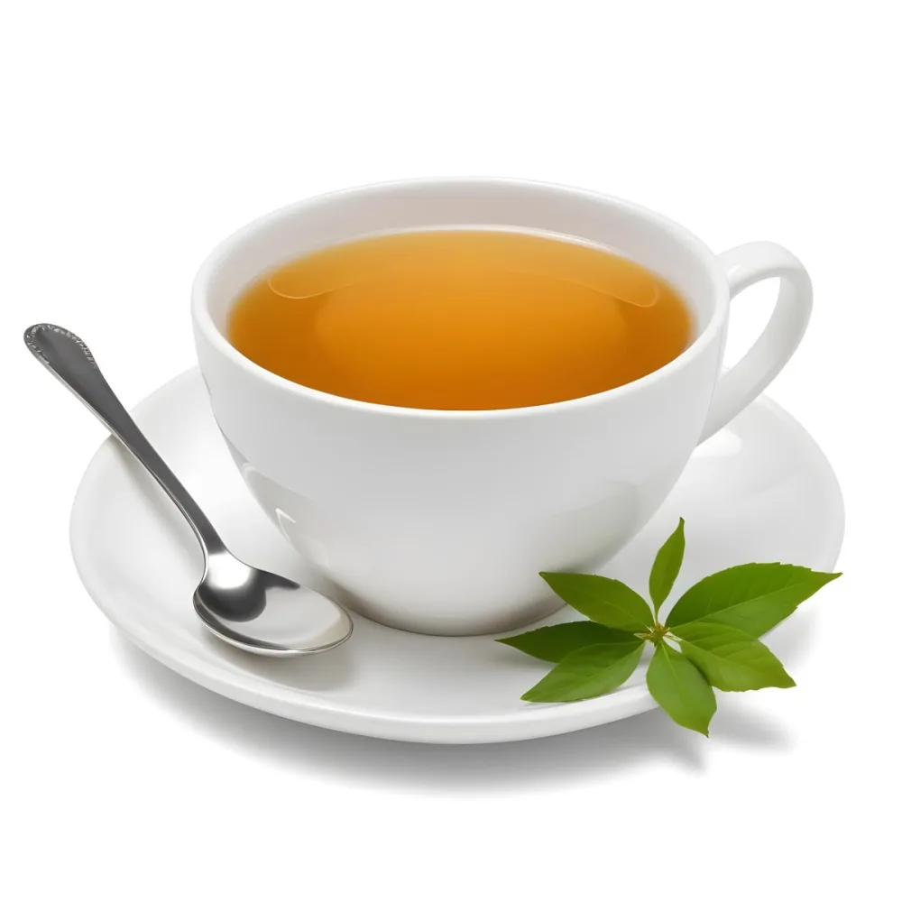 A White Ceramic Cup Filled With Orange Tea Garnished With A Slice Of Orange And Green Leaves Placed On A White Saucer With A Spoon 35 1ba6