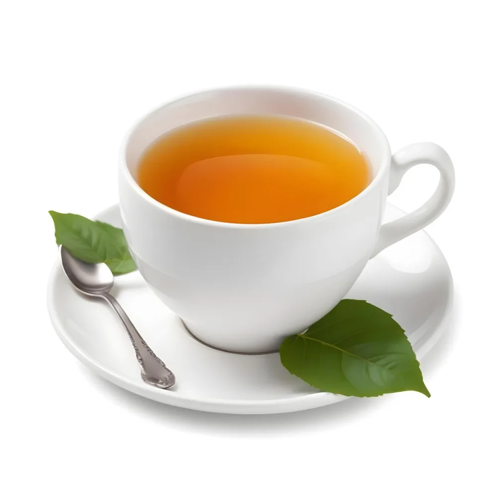 A White Ceramic Cup Filled With Orange Tea Garnished With A Slice Of Orange And Green Leaves Placed On A White Saucer With A Spoon 36 98fa