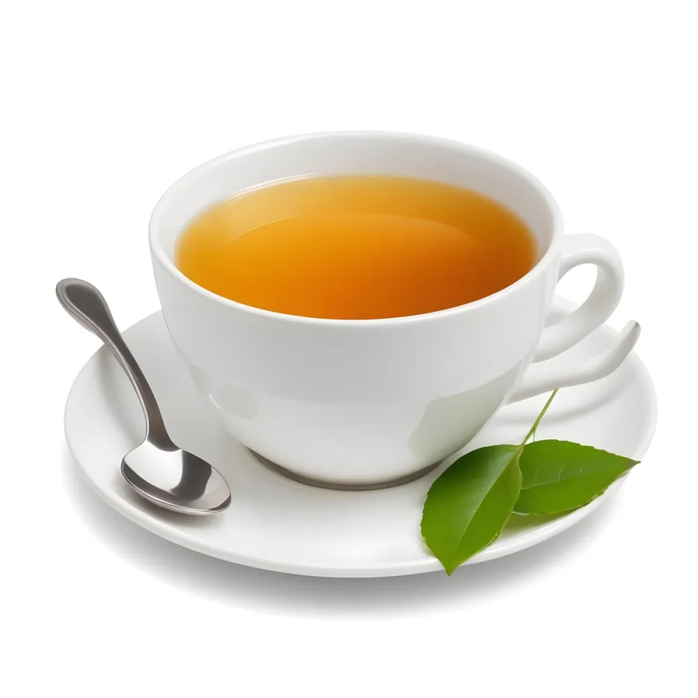 A White Ceramic Cup Filled With Orange Tea Garnished With A Slice Of Orange And Green Leaves Placed On A White Saucer With A Spoon 8 Fb53