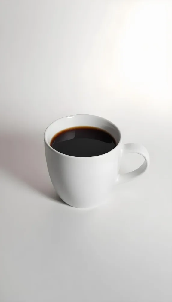 A White Ceramic Mug Filled With Black Coffee Casting A Shadow On A Black Surface Simple And Minimalist Composition Studio Lighting Clean And Modern Aesthetic 27 F0d3