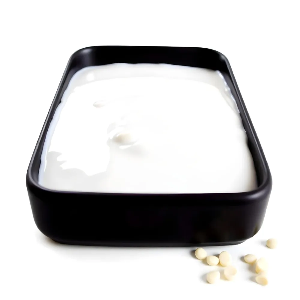 A White Square Plate With Rounded Corners Filled With White Liquid On A White Background 5 36eb