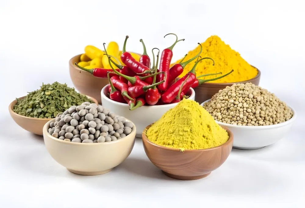 Bowls Of Spices Including Turmeric Chili Peppers Cumin Coriander And Other Ingredients Arranged On A White Surface Creating A Vibrant And Colorful Display Of Culinary Ingredients 20 Ca4d