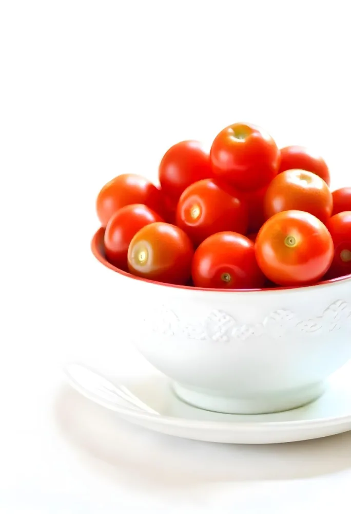 Cherry Tomatoes In A Red Bowl The Tomatoes Are Red And Ripe The Background Is Red And Out Of Focus 31 Ec28