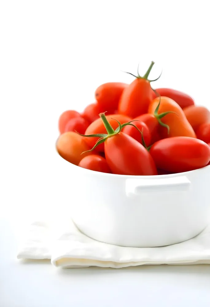 Cherry Tomatoes In A Red Bowl The Tomatoes Are Red And Ripe The Background Is Red And Out Of Focus 32 Af16
