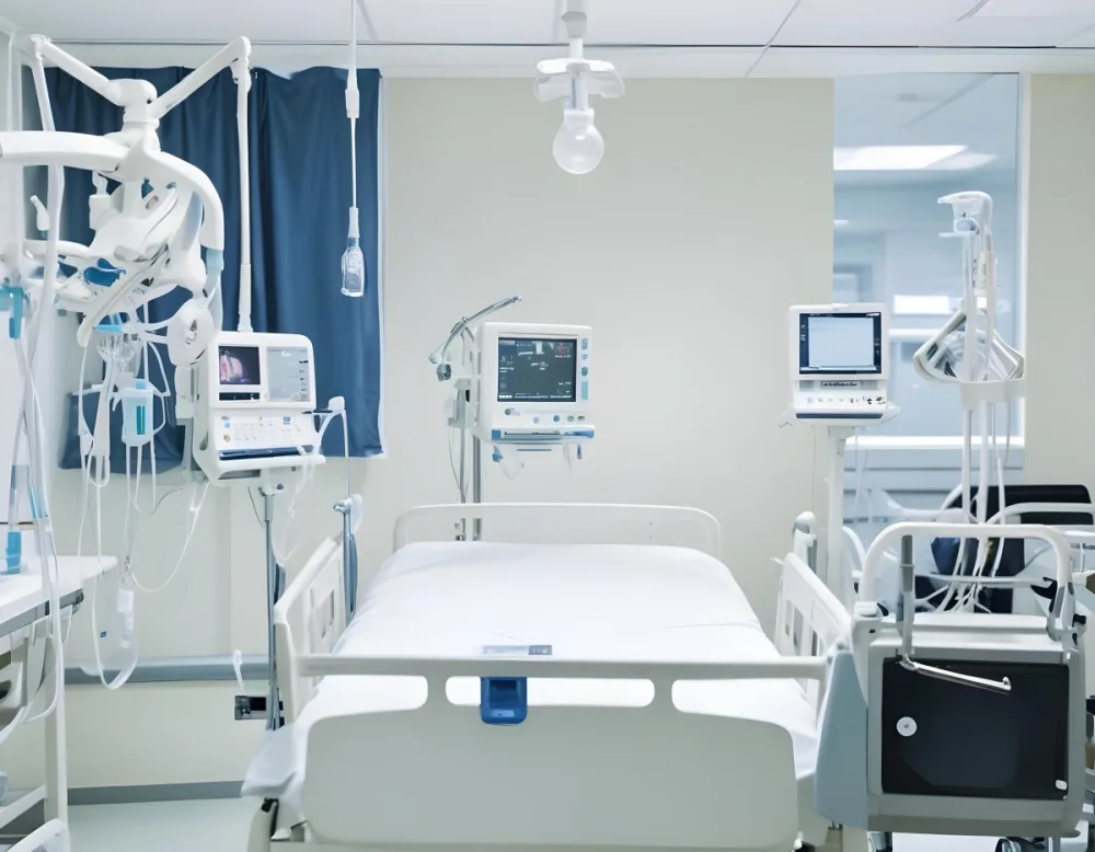 An Empty Hospital Bed With Medical Equipment Attached To It The Background Is A Hospital Room 3 E418