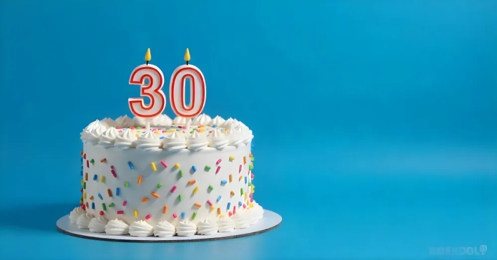 A 30th Birthday Cake With Candles On Top White Frosting And Sprinkles On A Blue Background 24 8c77