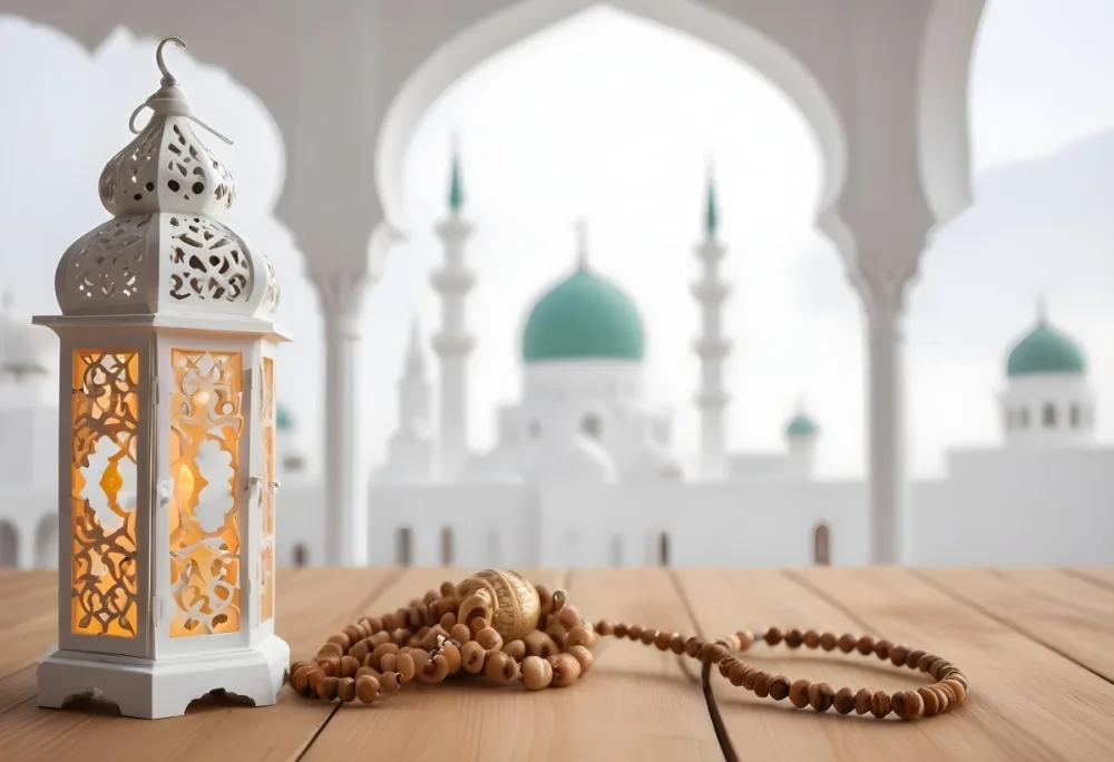A Lantern And A Tasbih On A Wooden Table In The Background A Mosque With White Arches 22 15a8