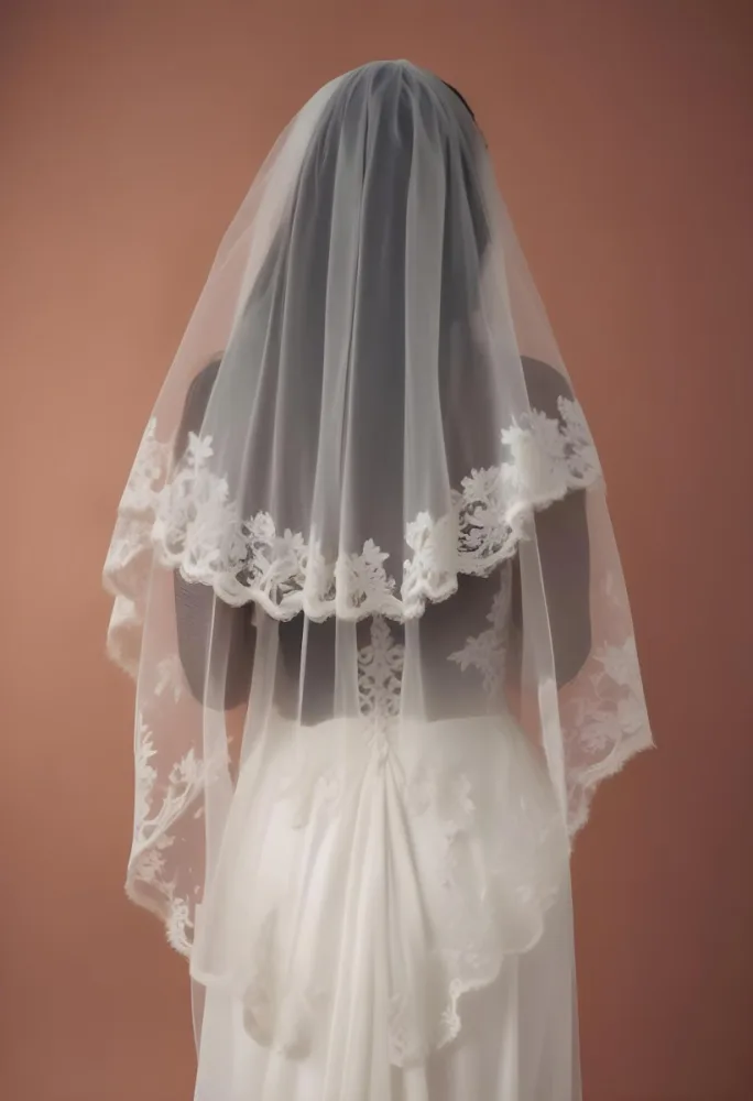 A White Wedding Dress With A Long Flowing Veil Featuring Lace Detailing 16 1c9c