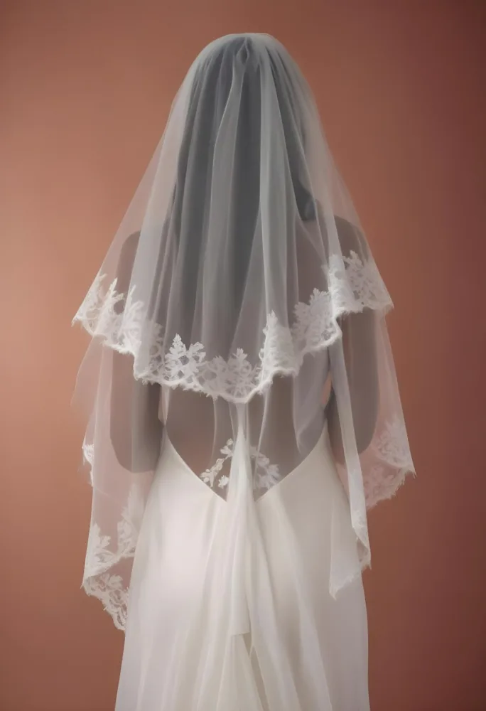 A White Wedding Dress With A Long Flowing Veil Featuring Lace Detailing 9 Fbae