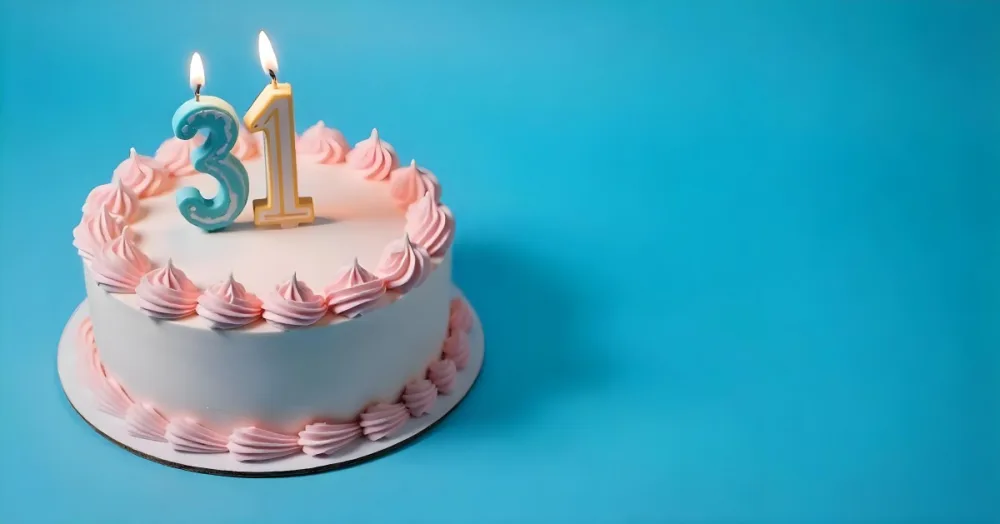 Birthday Cake With Pink Frosting And The Number 31 Candles On Top In A Blue Background 18 A446