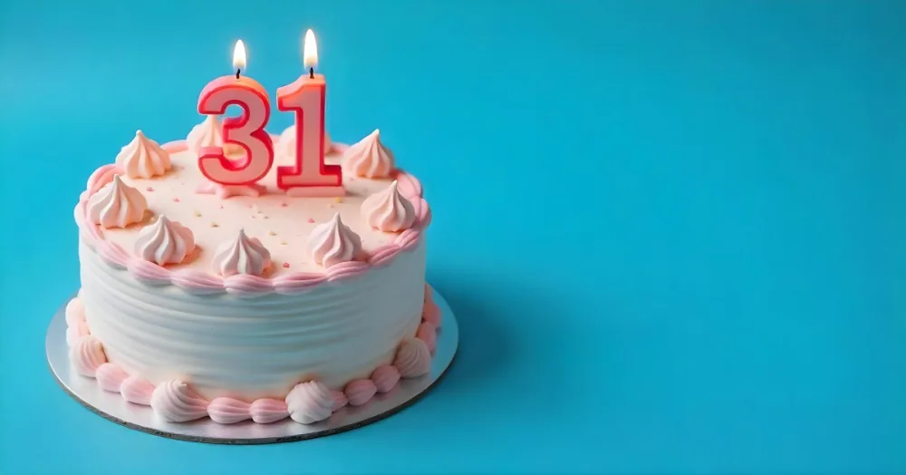 Birthday Cake With Pink Frosting And The Number 31 Candles On Top In A Blue Background 27 7618
