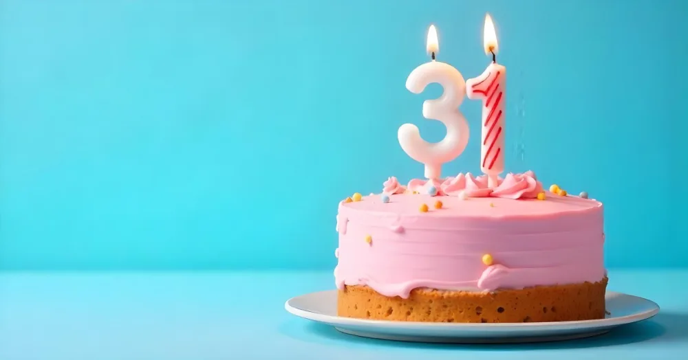 Birthday Cake With Pink Frosting And The Number 31 Candles On Top In A Blue Background 28 D374