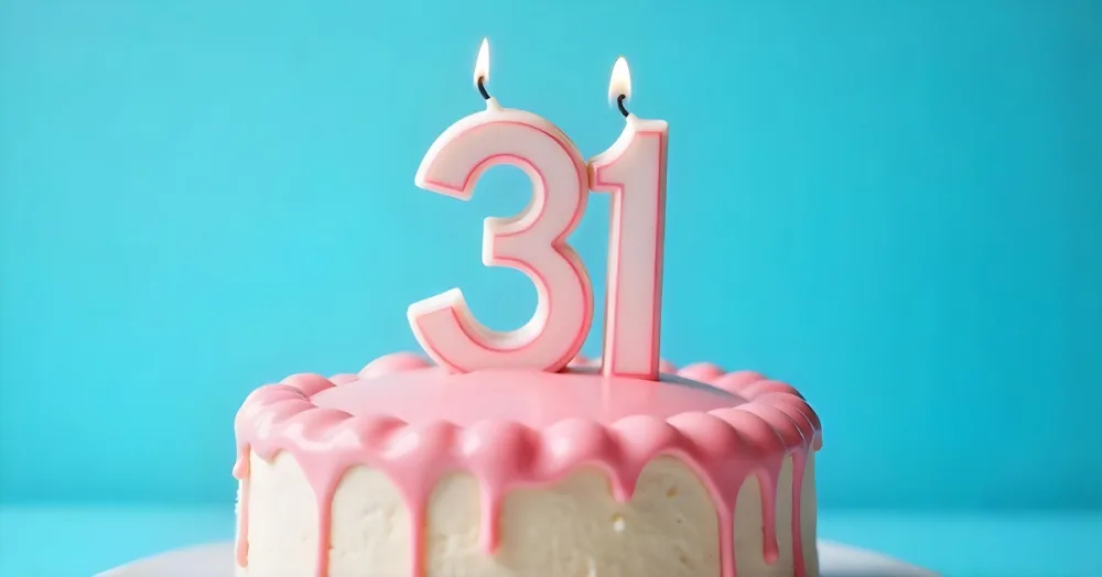 Birthday Cake With Pink Frosting And The Number 31 Candles On Top In A Blue Background 29 21f9