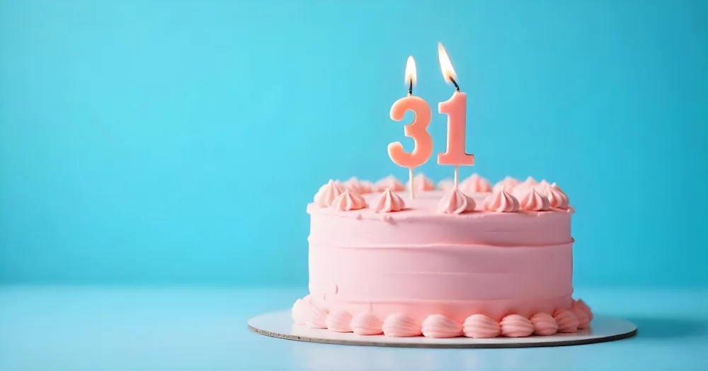 Birthday Cake With Pink Frosting And The Number 31 Candles On Top In A Blue Background 4 Abb9