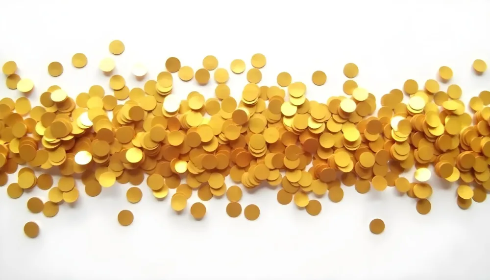 Golden Confetti Scattered On A White Surface Creating A Textured And Shimmering Effect Ideal For Festive Backgrounds Or Celebratory Designs With A Clean And Minimalist Aesthetic 38 2360