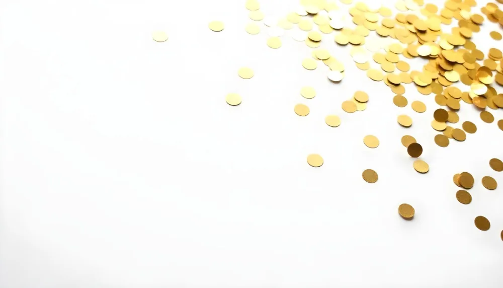 Golden Confetti Scattered On A White Surface Creating A Textured And Shimmering Effect Ideal For Festive Backgrounds Or Celebratory Designs With A Clean And Minimalist Aesthetic 5 02cf