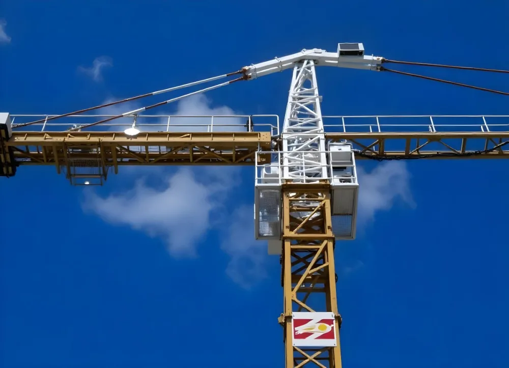 A Large Yellow Construction Crane Against A Bright Blue Sky 11 5803