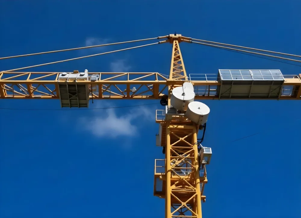 A Large Yellow Construction Crane Against A Bright Blue Sky 7 B993