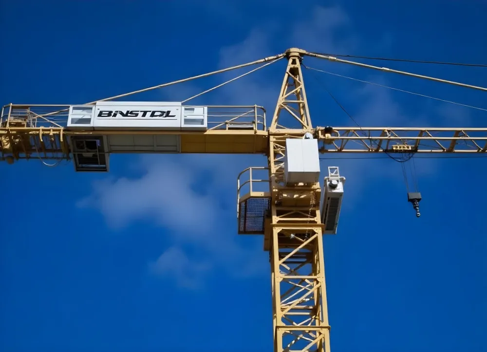 A Large Yellow Construction Crane Against A Bright Blue Sky 9 Fcb2
