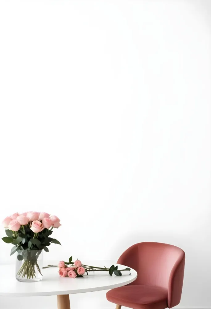 A Bouquet Of Pink Roses On A White Table Next To A Red Chair Against A White Wall In A Minimalist Room 20 E04d