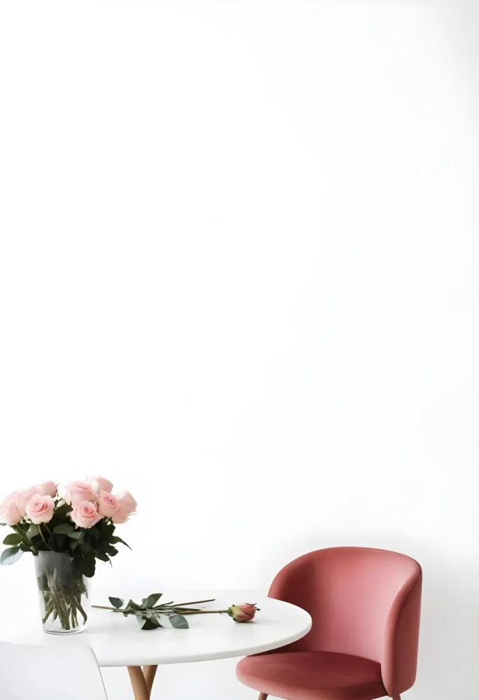 A Bouquet Of Pink Roses On A White Table Next To A Red Chair Against A White Wall In A Minimalist Room 7 Afc0