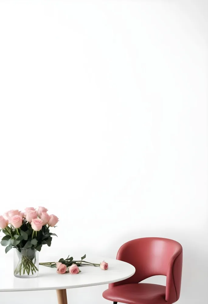 A Bouquet Of Pink Roses On A White Table Next To A Red Chair Against A White Wall In A Minimalist Room 9 8856