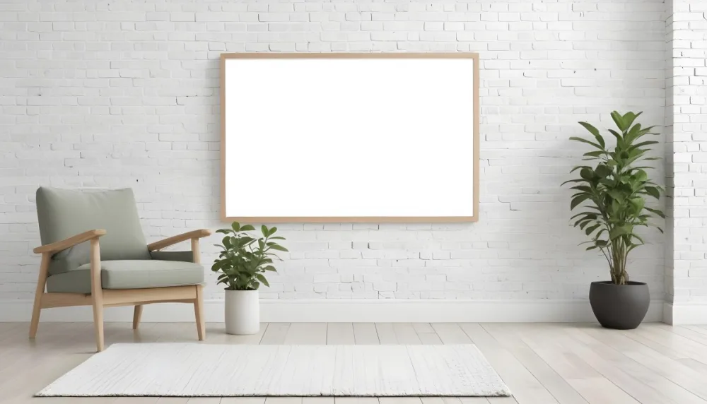 A Minimalist Interior Scene Featuring A White Brick Wall A Large Empty Wooden Frame Mounted On The Wall A Light Colored Wooden Floor A Cozy Green Armchair And A Small Green Plant In A Pot Beside The Chair A Soft Gray 42 A02b