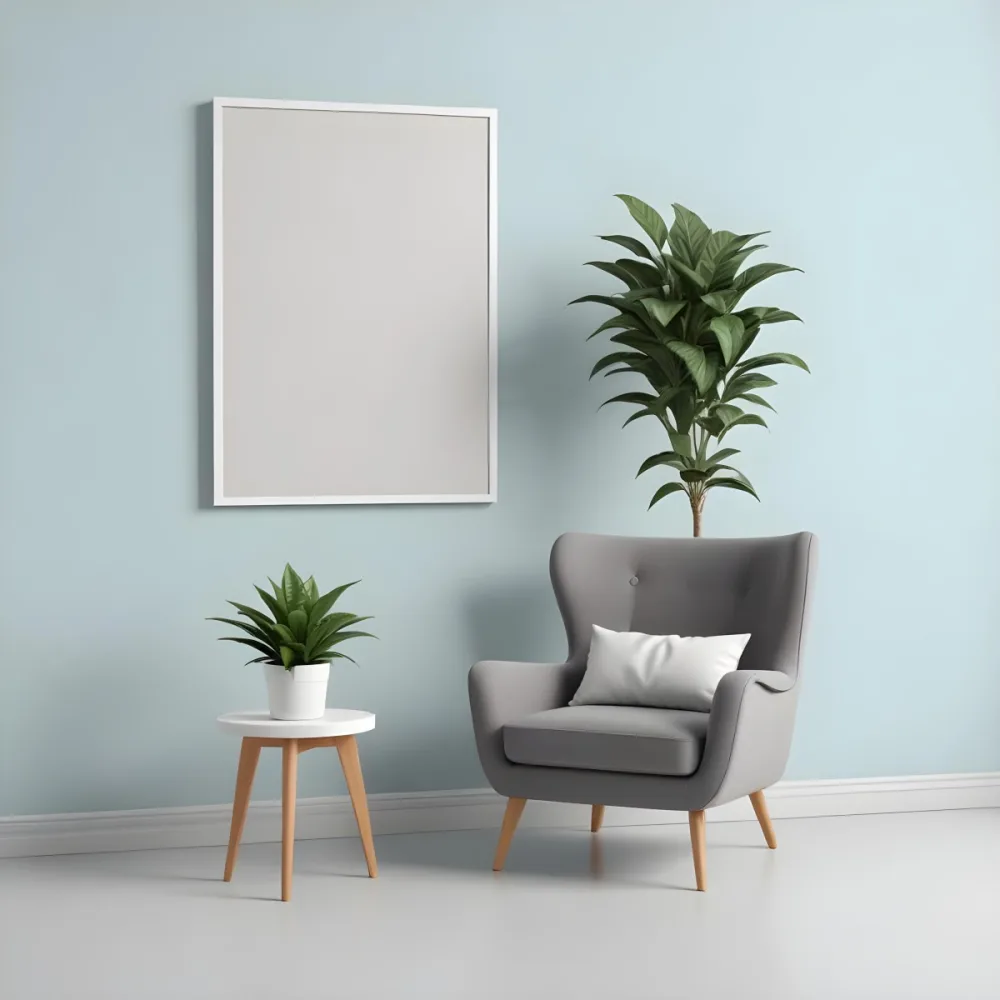 A Modern Living Room With A Gray Armchair A White Framed Wall Art And A Wooden Side Table With A Potted Plant 14 C8cb