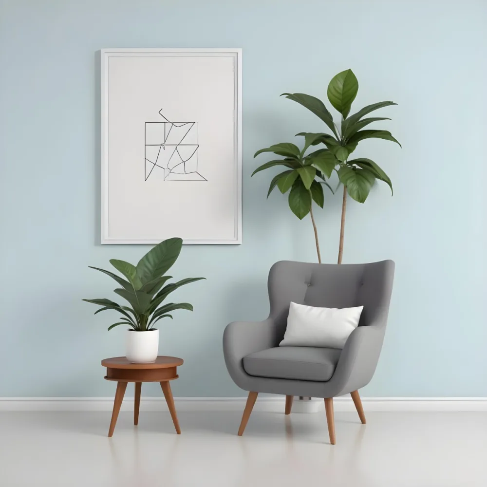 A Modern Living Room With A Gray Armchair A White Framed Wall Art And A Wooden Side Table With A Potted Plant 8 72d4