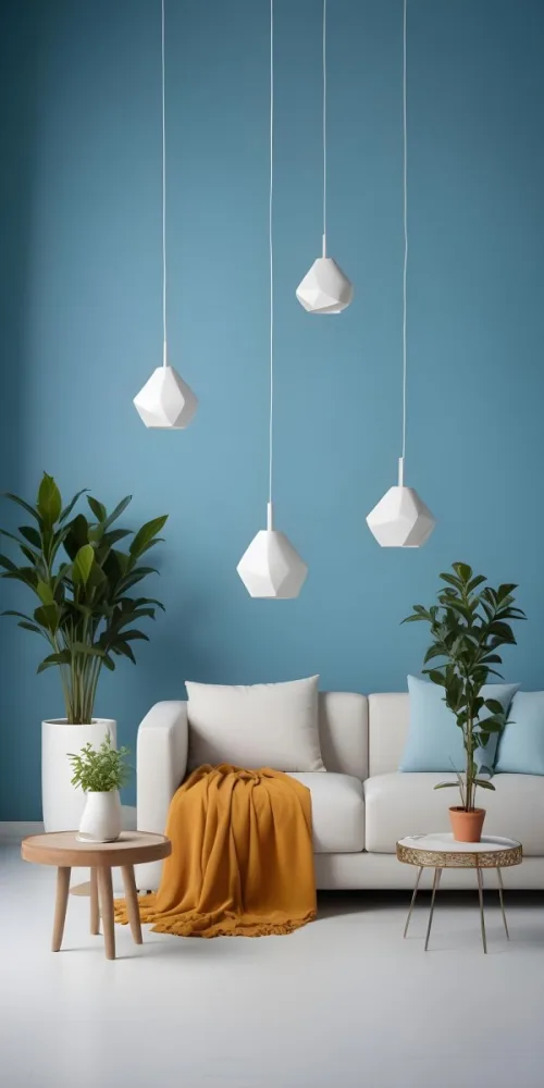 A Modern Living Room With A White Sofa A Potted Plant And Geometric Pendant Lights Hanging From The Ceiling Against A Blue Wall 5 D19c