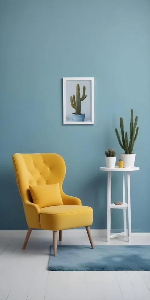 Yellow Armchair With A White Frame On The Wall And A White Table With Cactuses In A Blue Room 7 09de