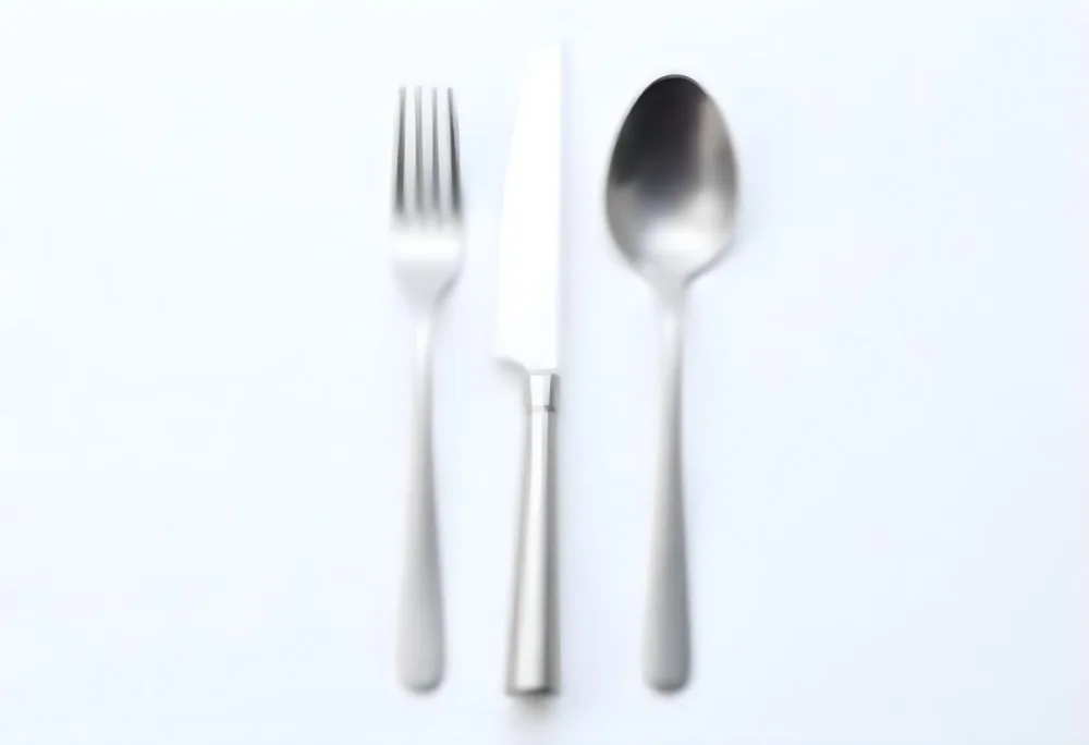 A Fork A Knife And A Spoon Made Of Stainless Steel On A White Background 8 56ae