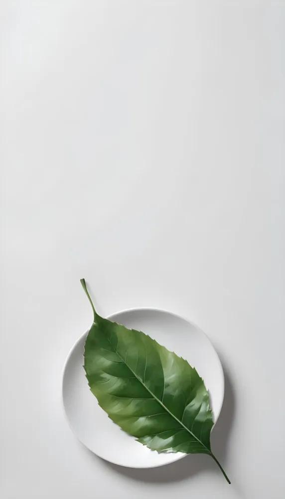 A Green Leaf On A White Plate Minimalist Composition Clean And Bright Aesthetic Soft Lighting White Background Nature Inspired Simple And Elegant Fresh And Organic 7 0bfe
