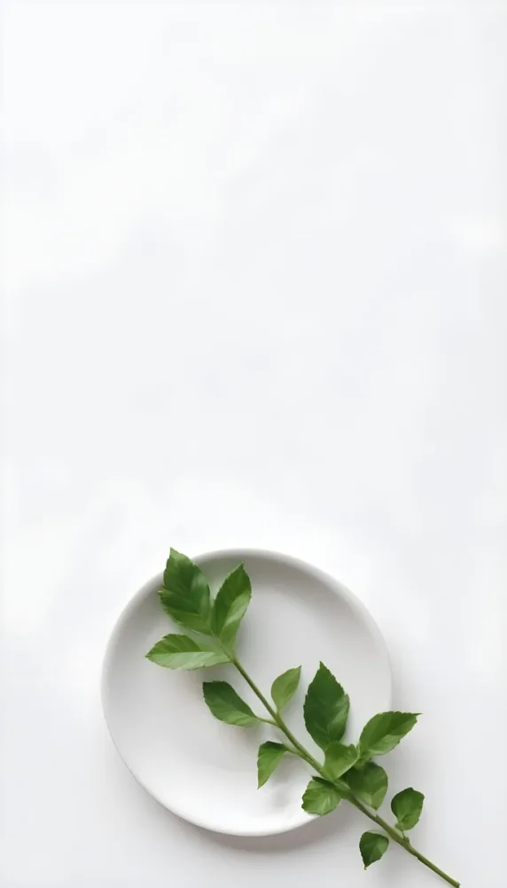 A Green Leaf On A White Plate Minimalist Composition Clean And Bright Aesthetic Soft Lighting White Background Nature Inspired Simple And Elegant Fresh And Organic 9 97a9