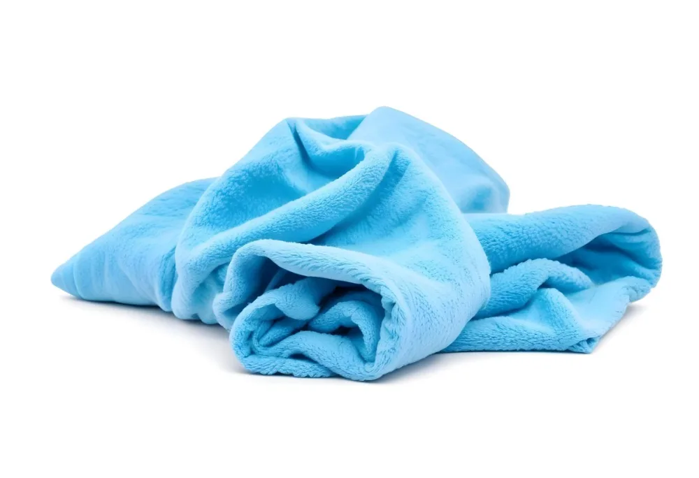 A Light Blue Towel Terrycloth Texture Folded And Crumpled Soft And Absorbent For Drying Or Cleaning On A White Background 3 Fc8d
