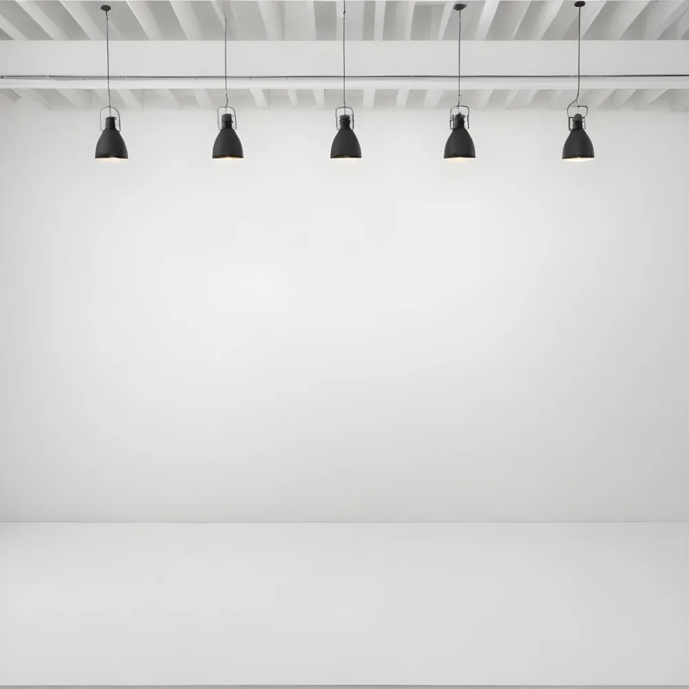 A Minimalist White Room With A High Ceiling And Hanging Pendant Lights 24 Ece9