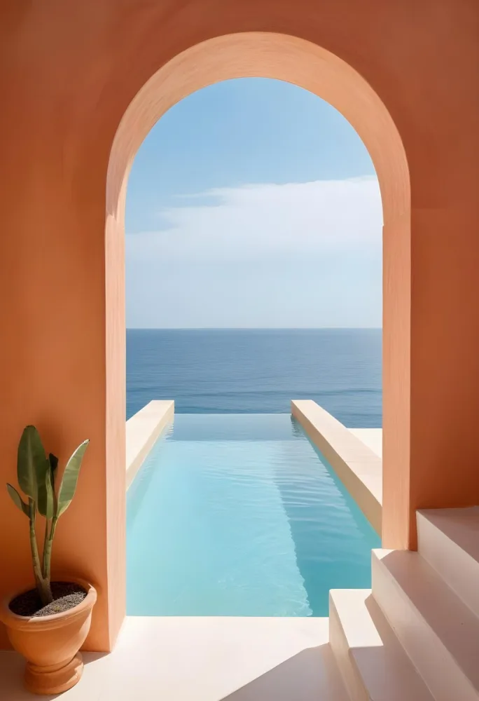 A Modern Infinity Pool Overlooking A Calm Turquoise Ocean Under A Clear Sky Framed By An Arched Doorway With Orange Walls 7 104c