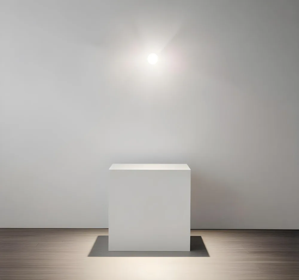 A White Cube Shaped Object On A Plain Background With A Bright Light Source Above It 5 13d2