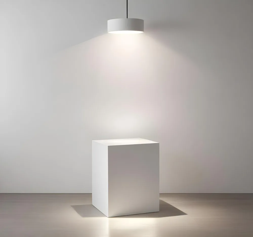 A White Cube Shaped Object On A Plain Background With A Bright Light Source Above It 6 Be35