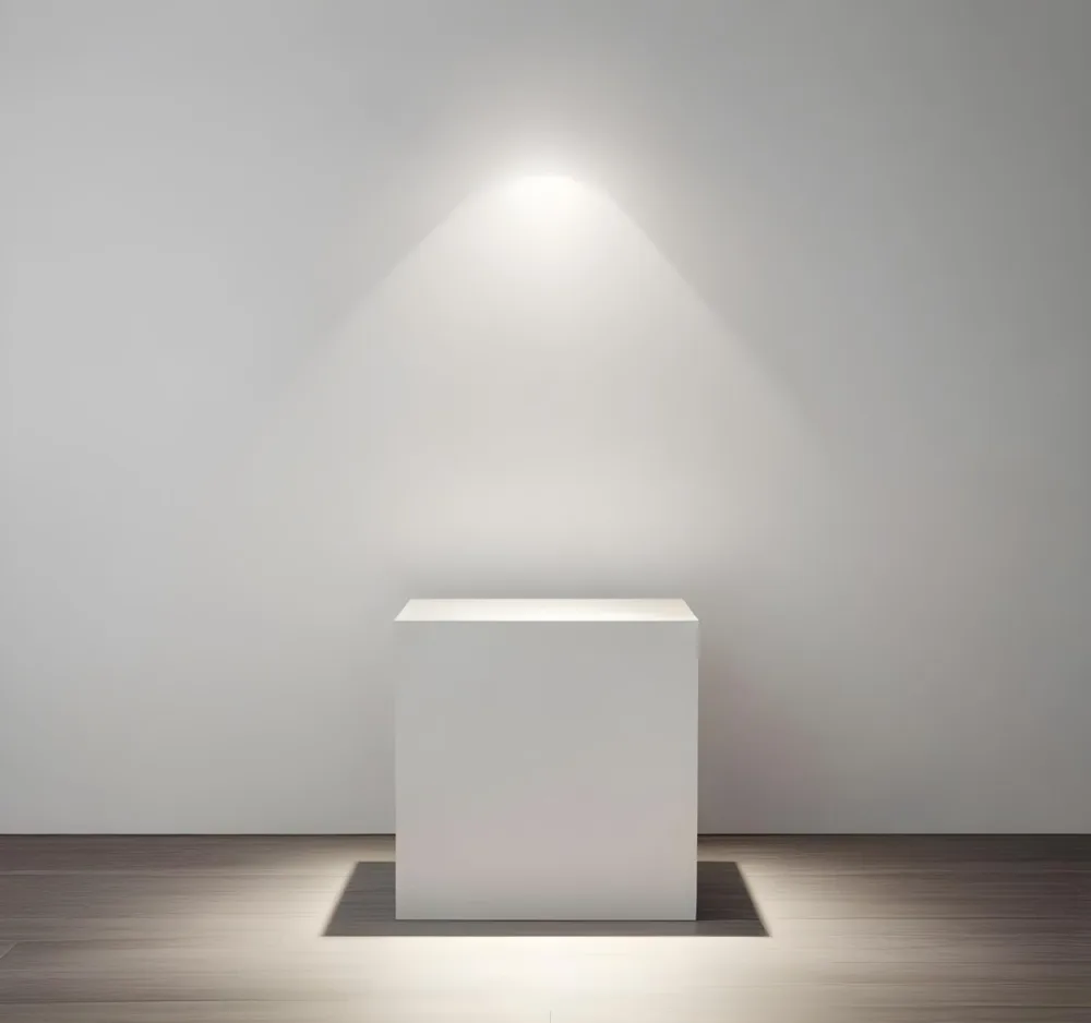 A White Cube Shaped Object On A Plain Background With A Bright Light Source Above It 7 F75c