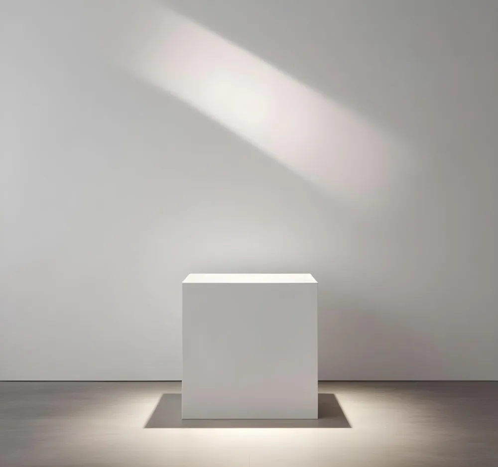 A White Cube Shaped Object On A Plain Background With A Bright Light Source Above It 9 C49a