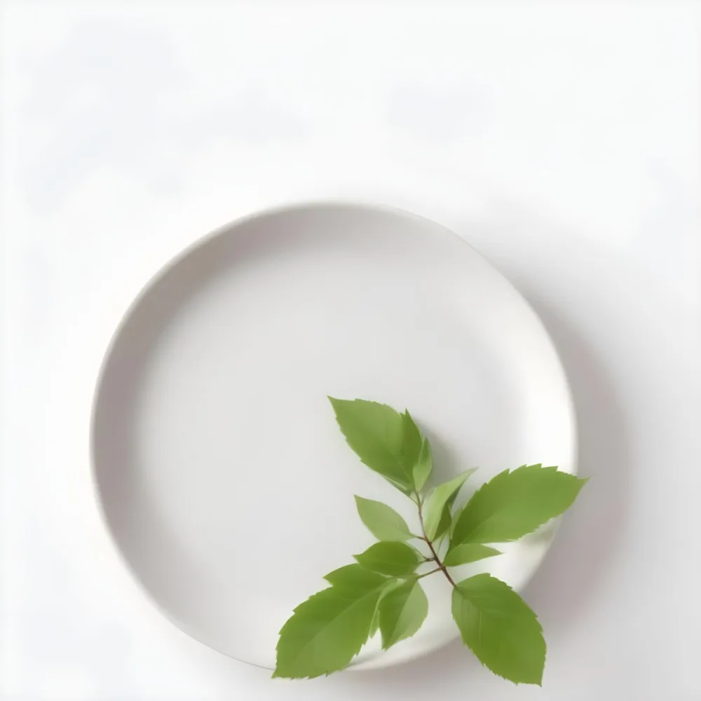 A White Plate With A Green Branch On Top Of It In A White Background 66 Ea59