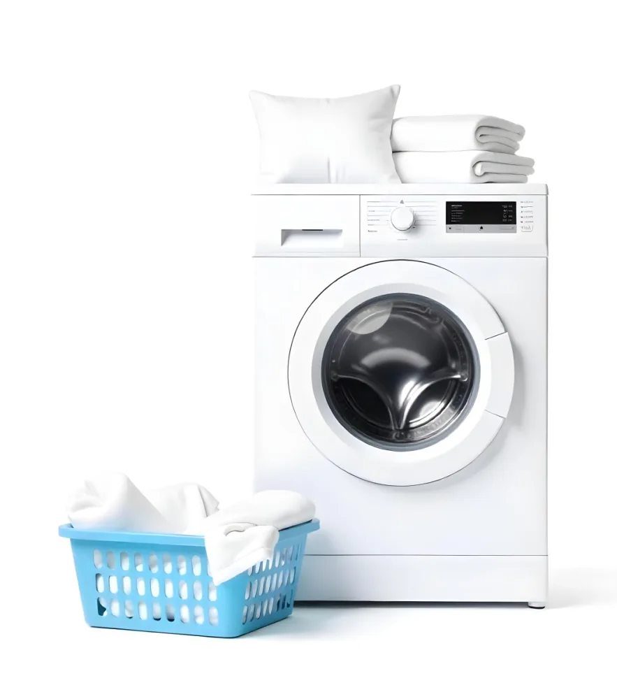 A White Washing Machine With Three White Pillows And Three Towels On Top A Blue Basket With White Clothes On A White Background 55 7dd5