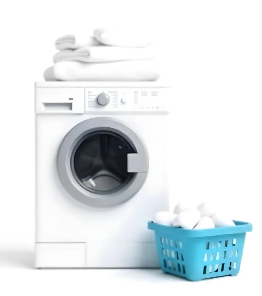A White Washing Machine With Three White Pillows And Three Towels On Top A Blue Basket With White Clothes On A White Background 66 A334
