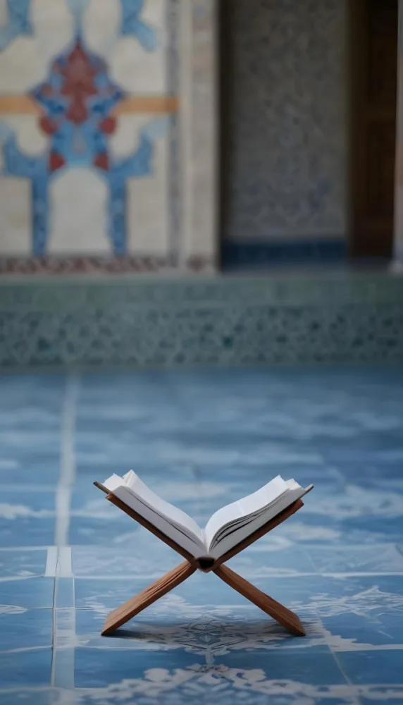 An Open Book Resting On A Wooden Stand Positioned On A Patterned Blue Floor The Background Features Blurred Architectural Elements Suggesting A Serene Indoor Space Possibly A Mosque Or A Similar Setting 22 7896