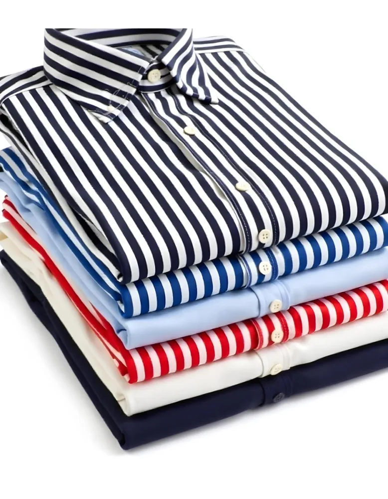 Stack Of Folded Shirts With Vertical Stripes In Black Blue Red And White Colors On A Black Surface 27 B328