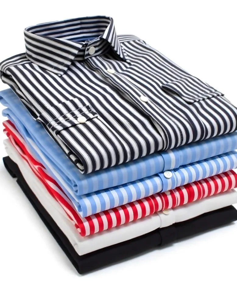 Stack Of Folded Shirts With Vertical Stripes In Black Blue Red And White Colors On A Black Surface 42 56db