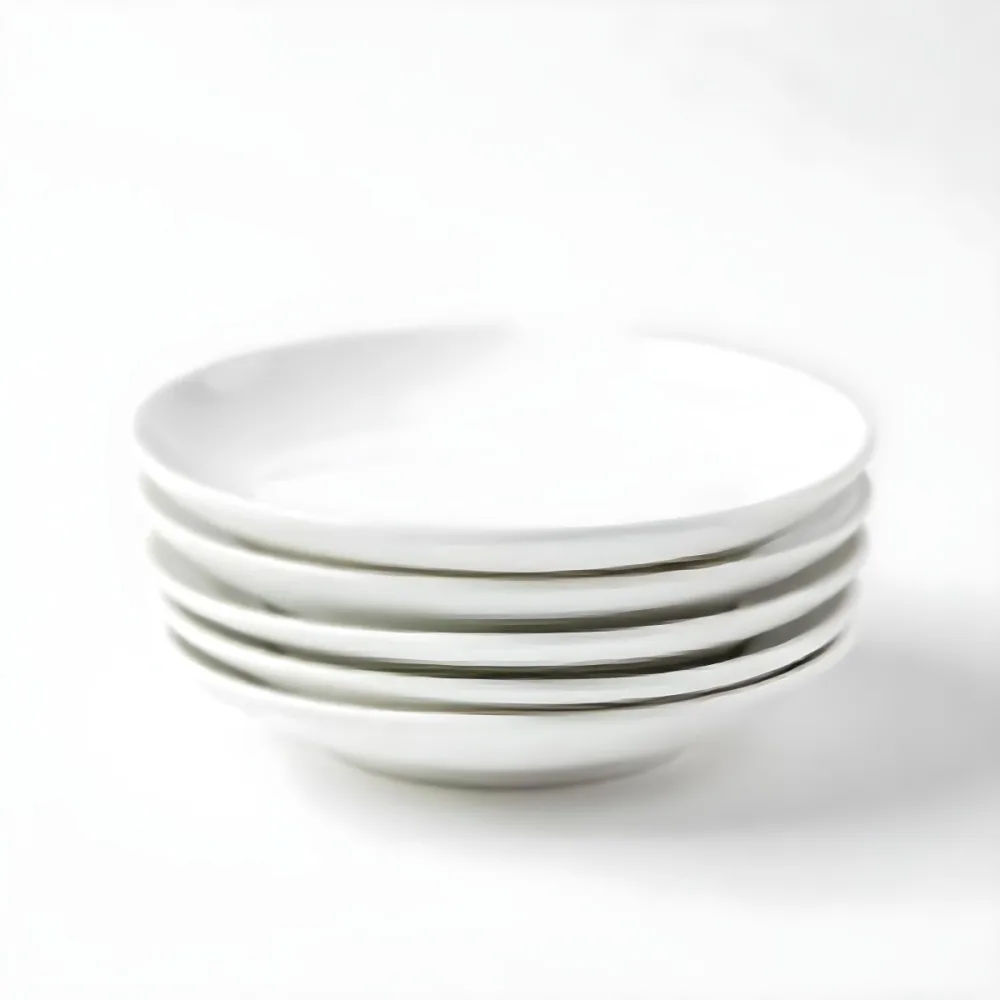 Stack Of Ten White Ceramic Plates Simple Design Uniform Size Smooth Surface Minimalist Aesthetic Clean Presentation White Background 2 09d3