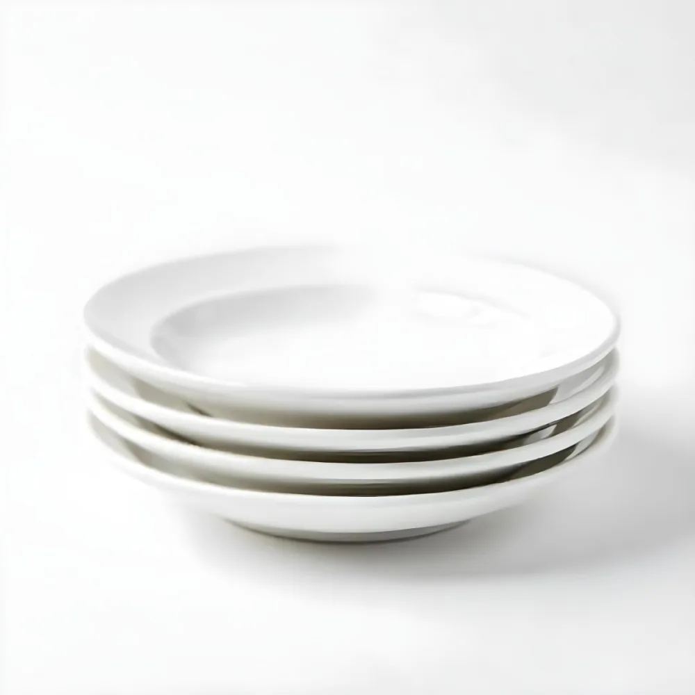 Stack Of Ten White Ceramic Plates Simple Design Uniform Size Smooth Surface Minimalist Aesthetic Clean Presentation White Background 9 9bda