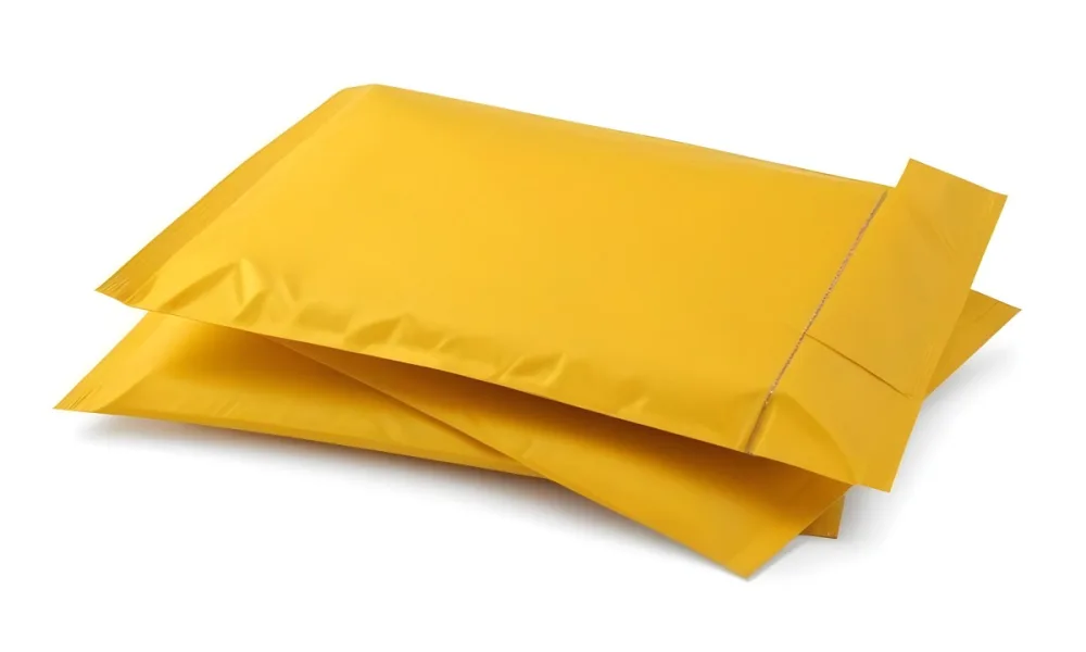 Two Yellow Bubble Mailers Stacked On Top Of Each Other The Top One Slightly Overlapping The Bottom One On A White Background 12 C7b6